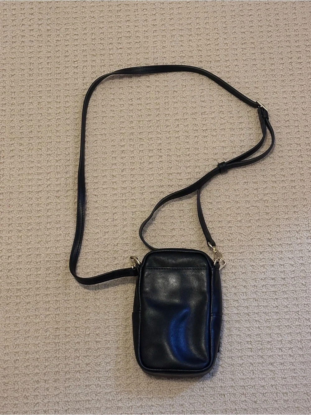 Tumi Black Leather Crossbody Phone Pouch with Silver Hardware